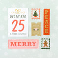 Load image into Gallery viewer, Crate Paper Holly Jolly Holiday Journaling  Ephemera Set on light blue snowflaked background
