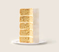 Load image into Gallery viewer, Lifestyle of Sweetshop White Cake
