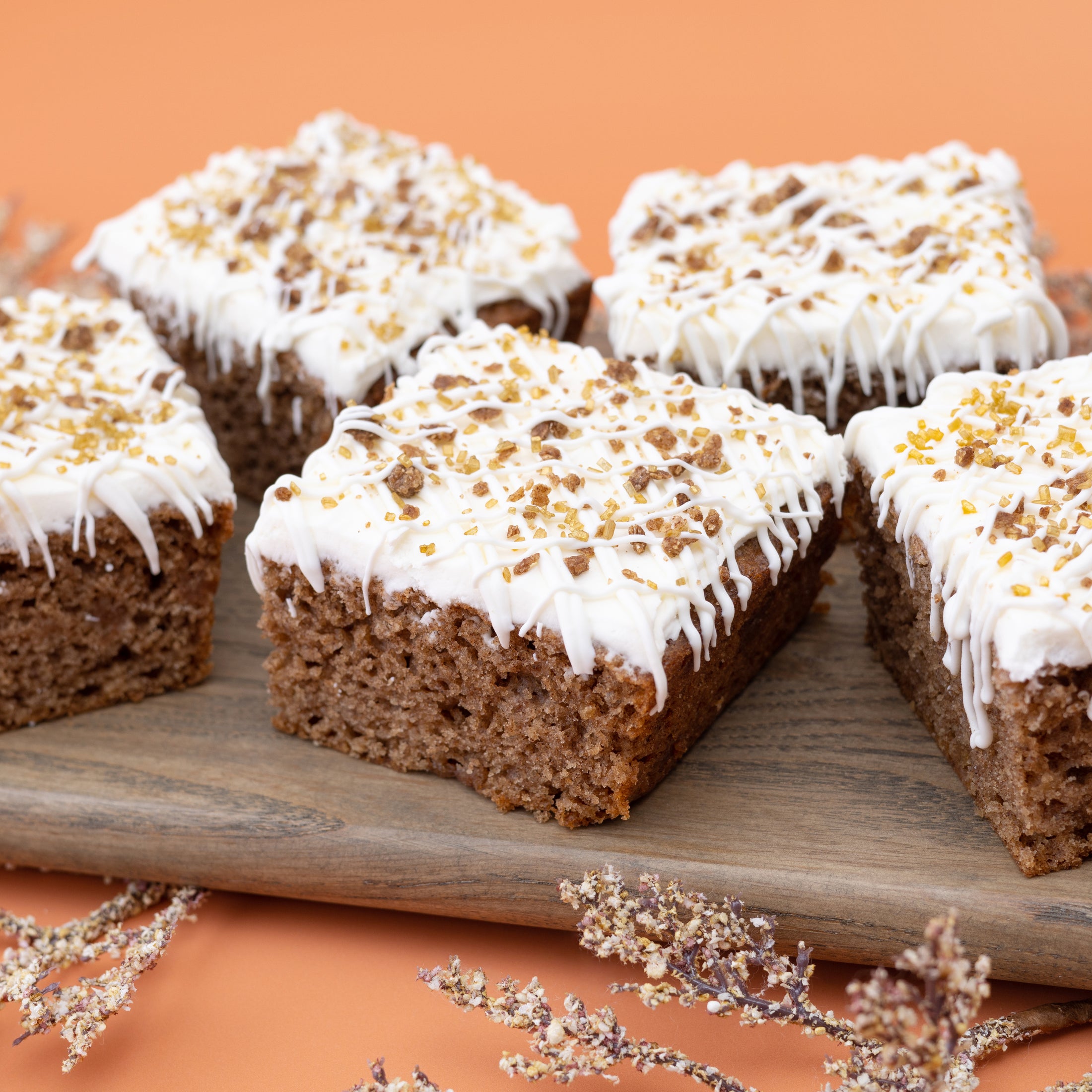 Cinnamon flavored desserts on orange background