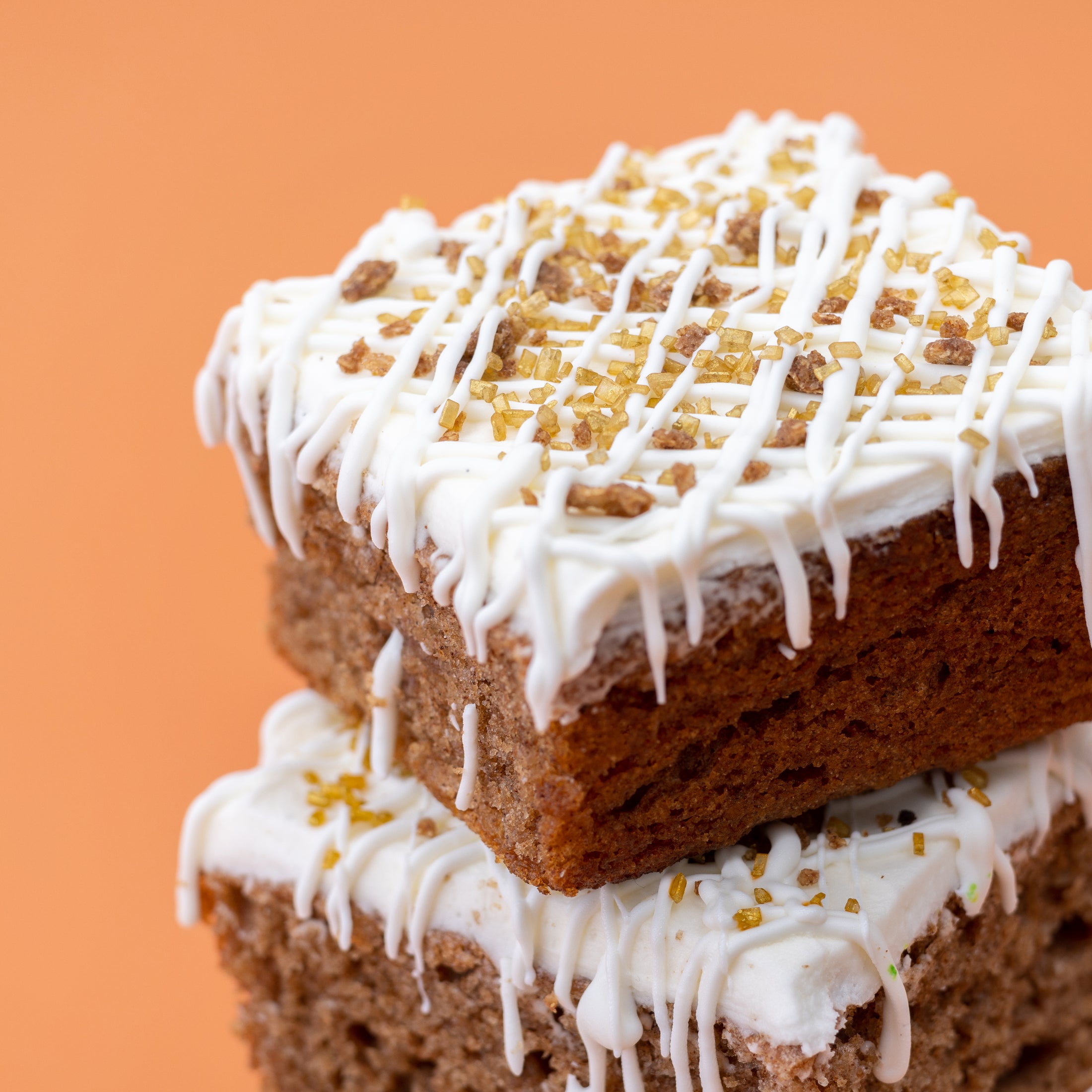 Close up of cinnamon flavored dessert on orange background