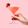 Load image into Gallery viewer, Handheld strawberry daiquiri glitter drink topped with strawberry
