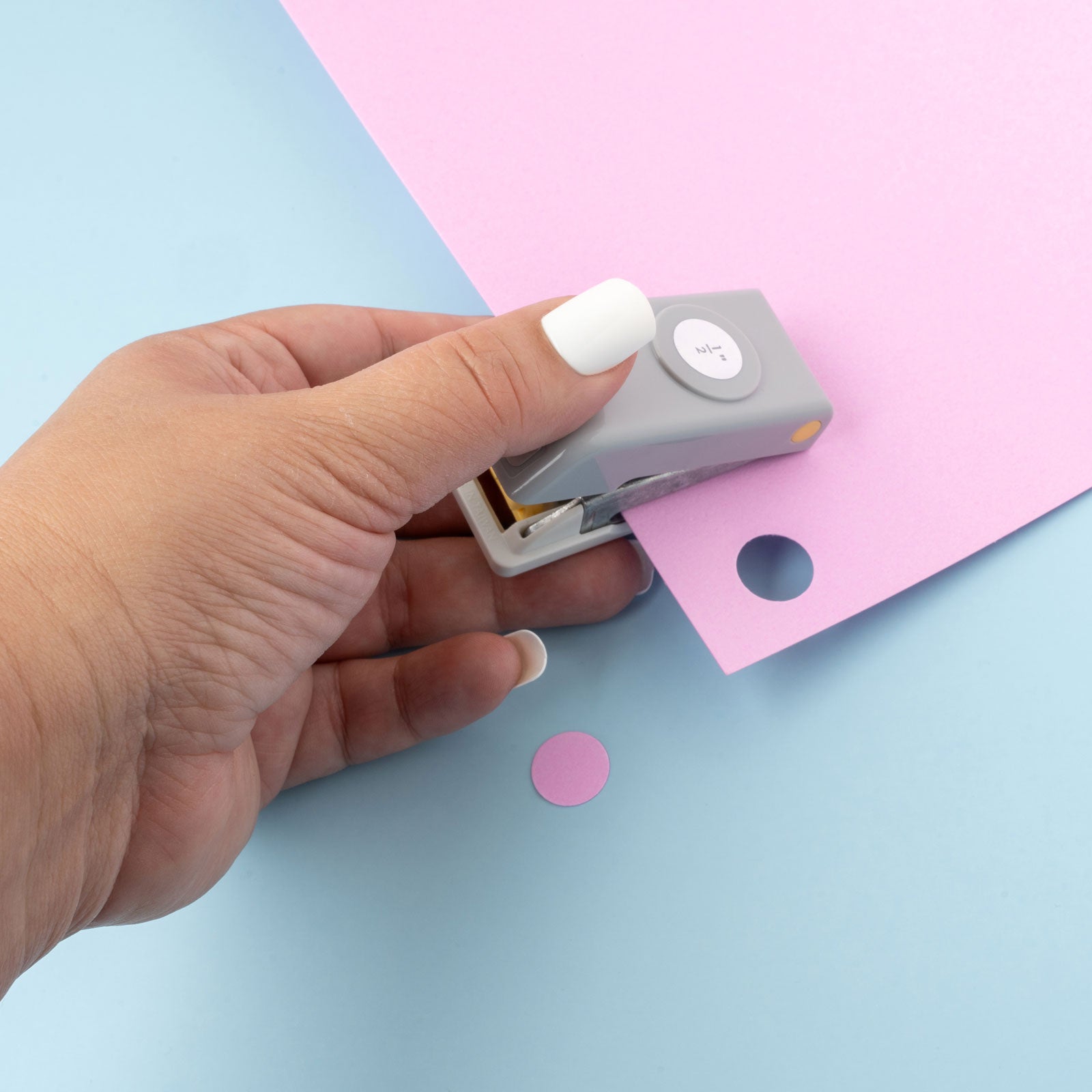Lifestyle image of EK Tools 1/2 Inch Circle Paper Punch being used