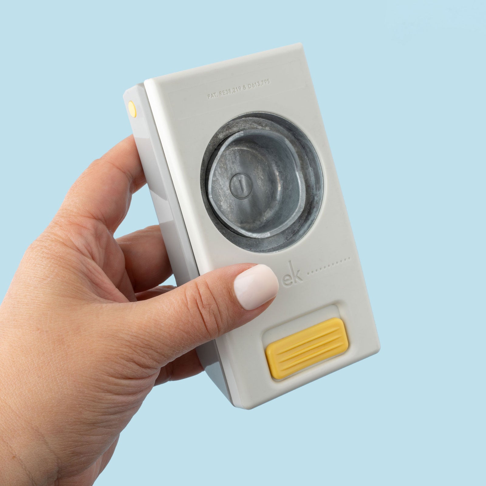 EK Tools 1 1/2 Inch Circle Paper Punch being held showing back of punch