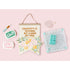Lifestyle image with banner craft with the We R Makers Precision Press Stamp and Stencil Holder Bundle