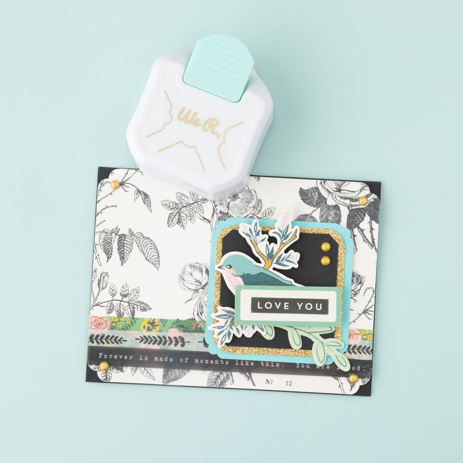 Lifestyle of crafts that used the We R Makers Decorative 3 Way Corner Paper Punch to punch the corners