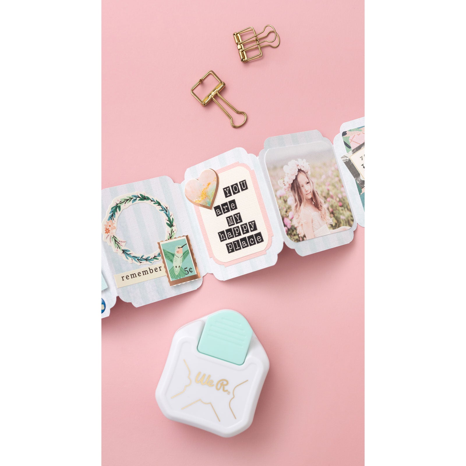 Lifestyle image of craft that has the corner punched with the We R Makers Decorative 3 Way Corner Paper Punch