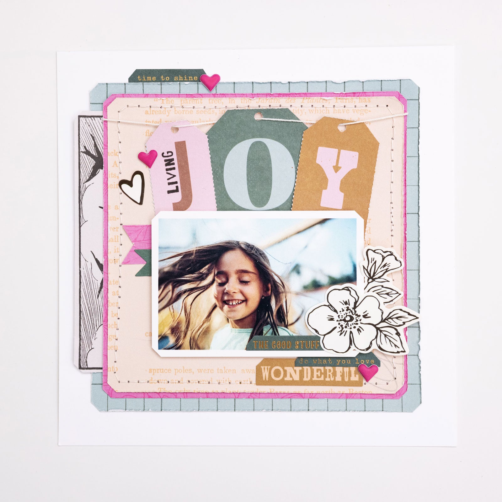 Paper craft that has corners punched with We R Makers 3-Way Diagonal Paper Punch