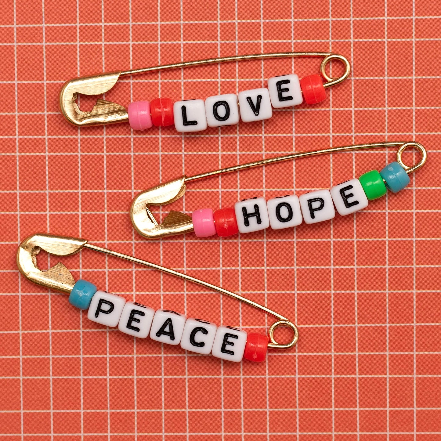 Jen Hadfield Reaching Out Metal Safety Pins-W/Phrase Beads
