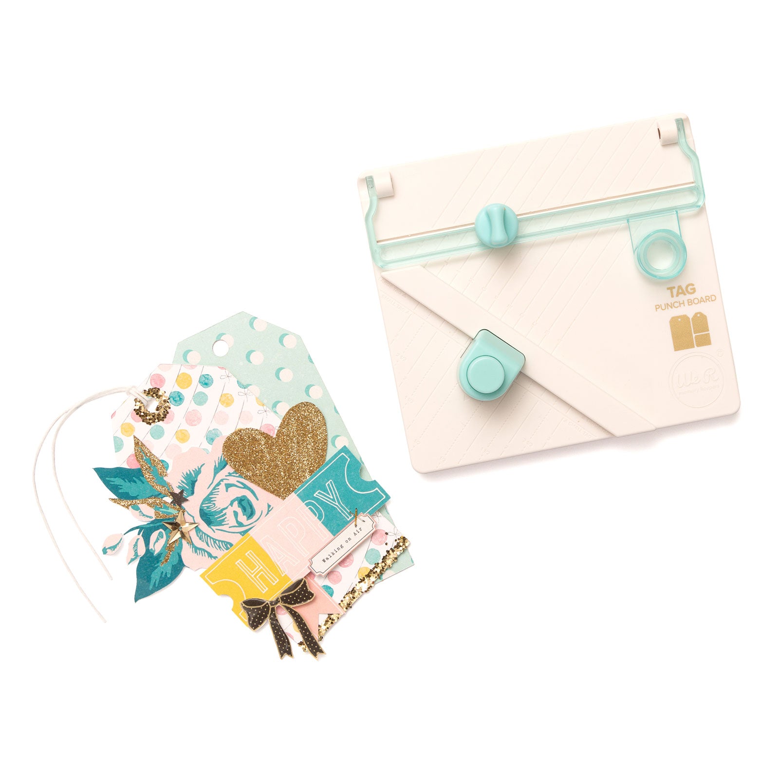 We R Makers Tag Punch Board with an assortment of tags