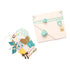 We R Makers Tag Punch Board with an assortment of tags