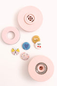 Load image into Gallery viewer, Lifestyle images of We R Makers Small Circle Button Press Insert with example buttons
