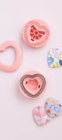 Livestyle images of We R Makers Heart Button Press Insert with heart shaped buttons
