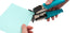 We R Makers Crop-A-Dile 1/4" & 1/2" Corner Chomper Punch being used on a piece of craft paper