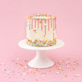 Load image into Gallery viewer, Lifestyle of decorated Sweetshop White Cake
