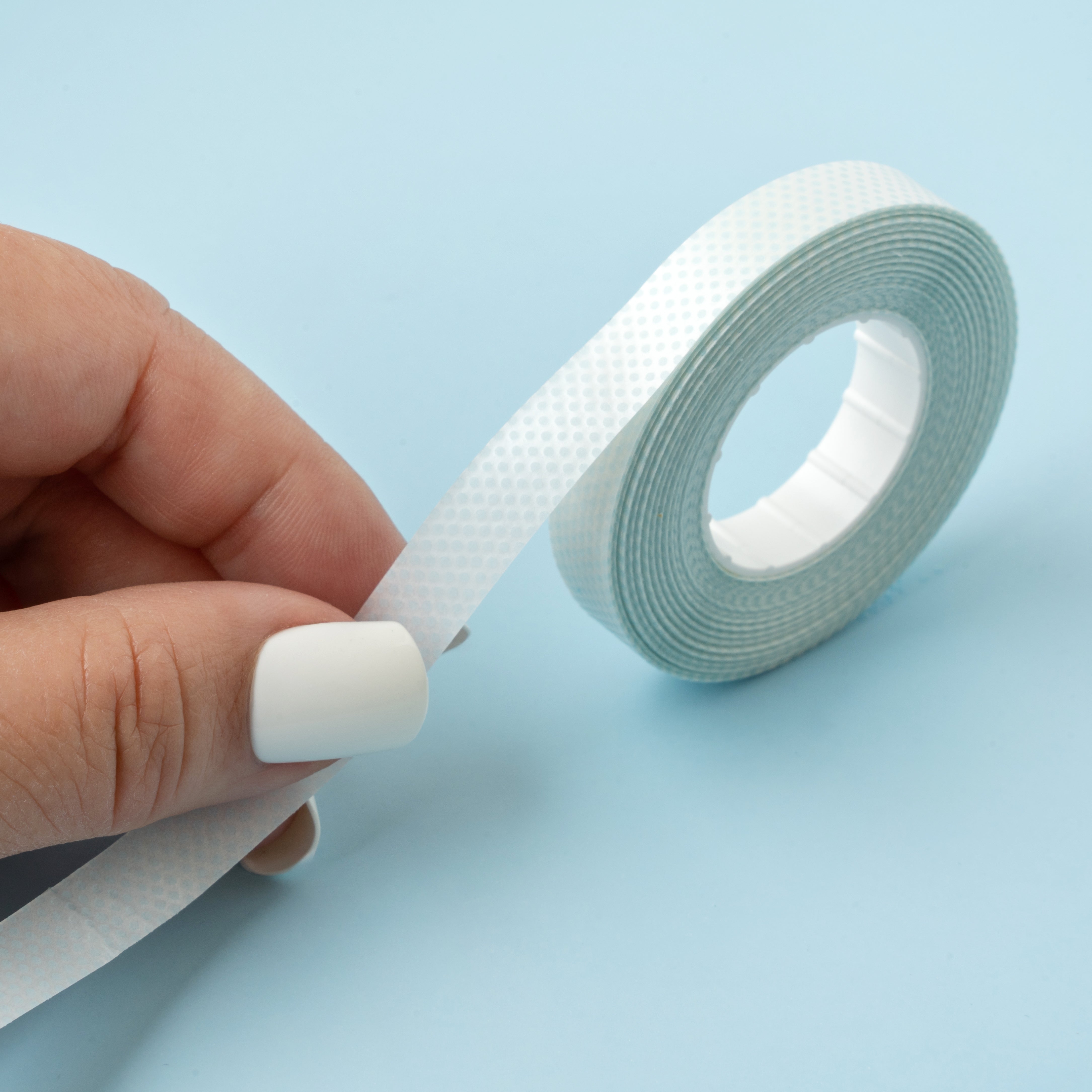 EK Tools Herma Dotto Repositionable Adhesive Refill being used