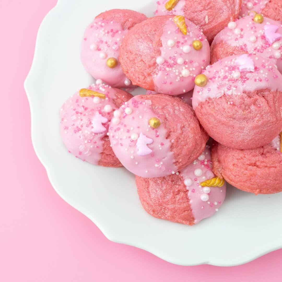 Lifestyle image of pink cookies decorating with Sweetshop 10 oz Unicorn Sprinkles Mix