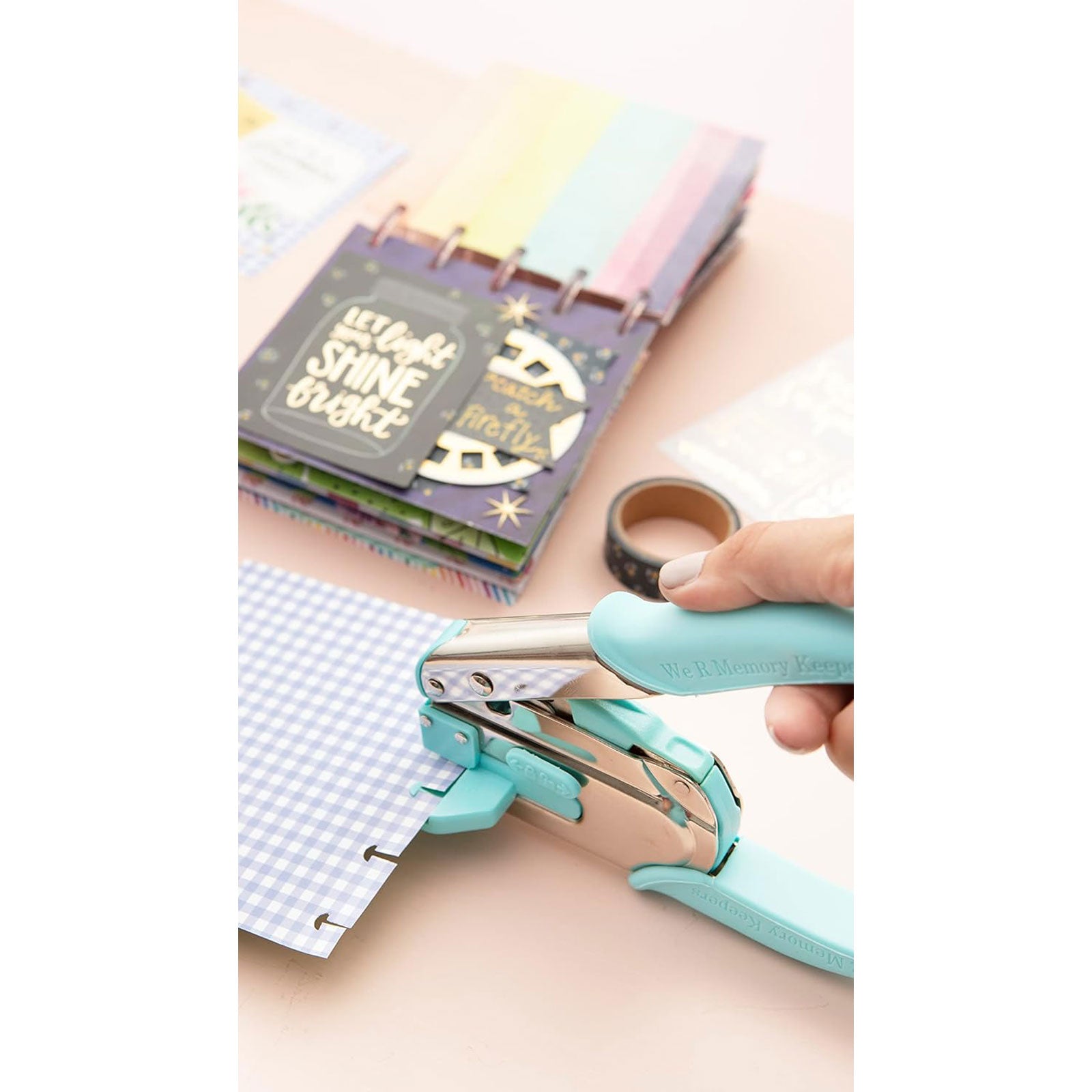 Lifestyle of We R Makers Crop-A-Dile Power Disc Punch being used