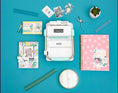 Load image into Gallery viewer, Mint Cinch Book Binding Machine surrounded by accessories
