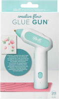 Load image into Gallery viewer, Front packaging of the We R Makers Creative Flow Glue Gun.
