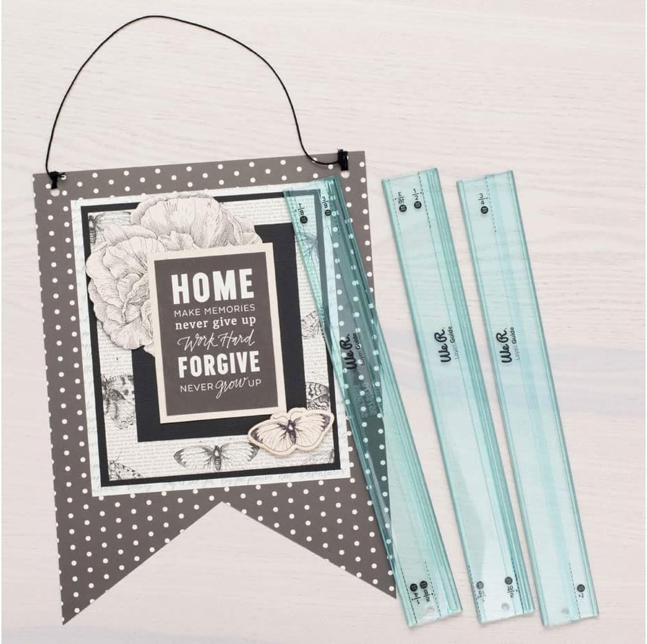 Picture of the We R Makers Layer Guides Tool next to a craft.