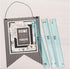 Picture of the We R Makers Layer Guides Tool next to a craft.