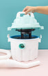 A picture of a person using the We R Makers Mold Press Wet/Dry Vacuum .
