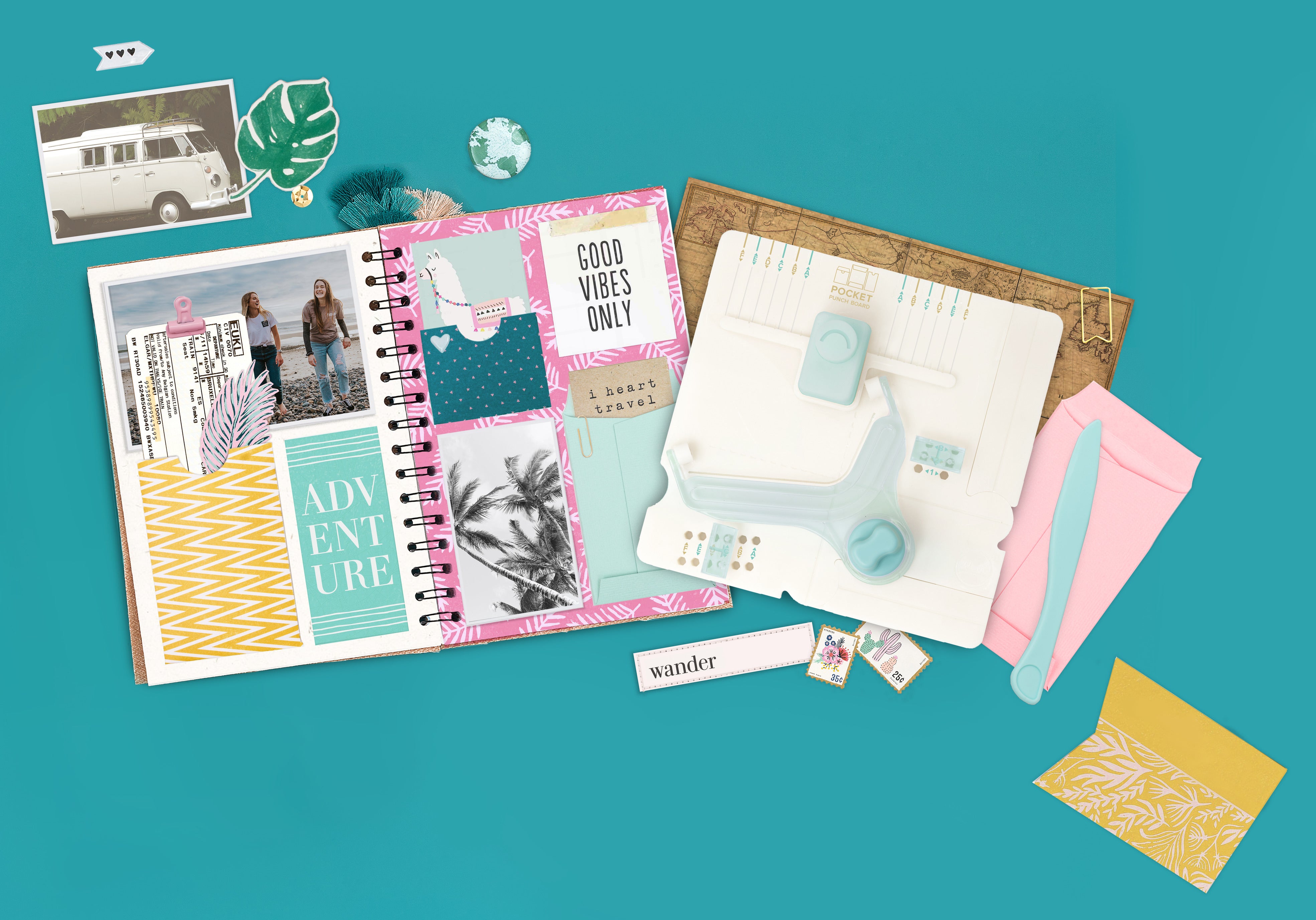 Picture of a We R Makers Pocket Maker Punch Board with art projects created by it.