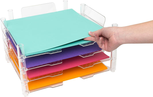 Lifestyle image of a person picking paper out of the We R Makers 12x12 Paper Trays.