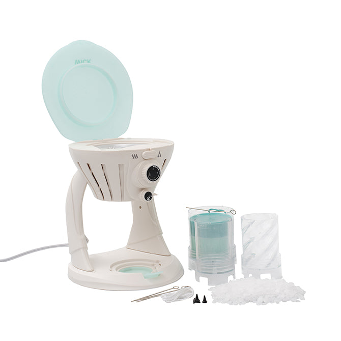 Items included in the We R Makers Wick Candle Making Kit.